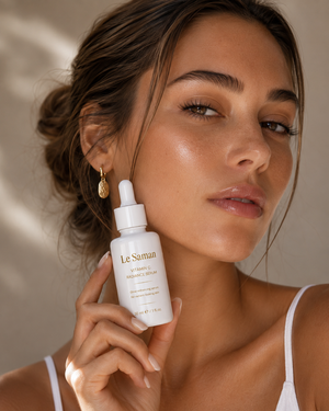 Woman holding Le Saman Vitamin C Face Serum